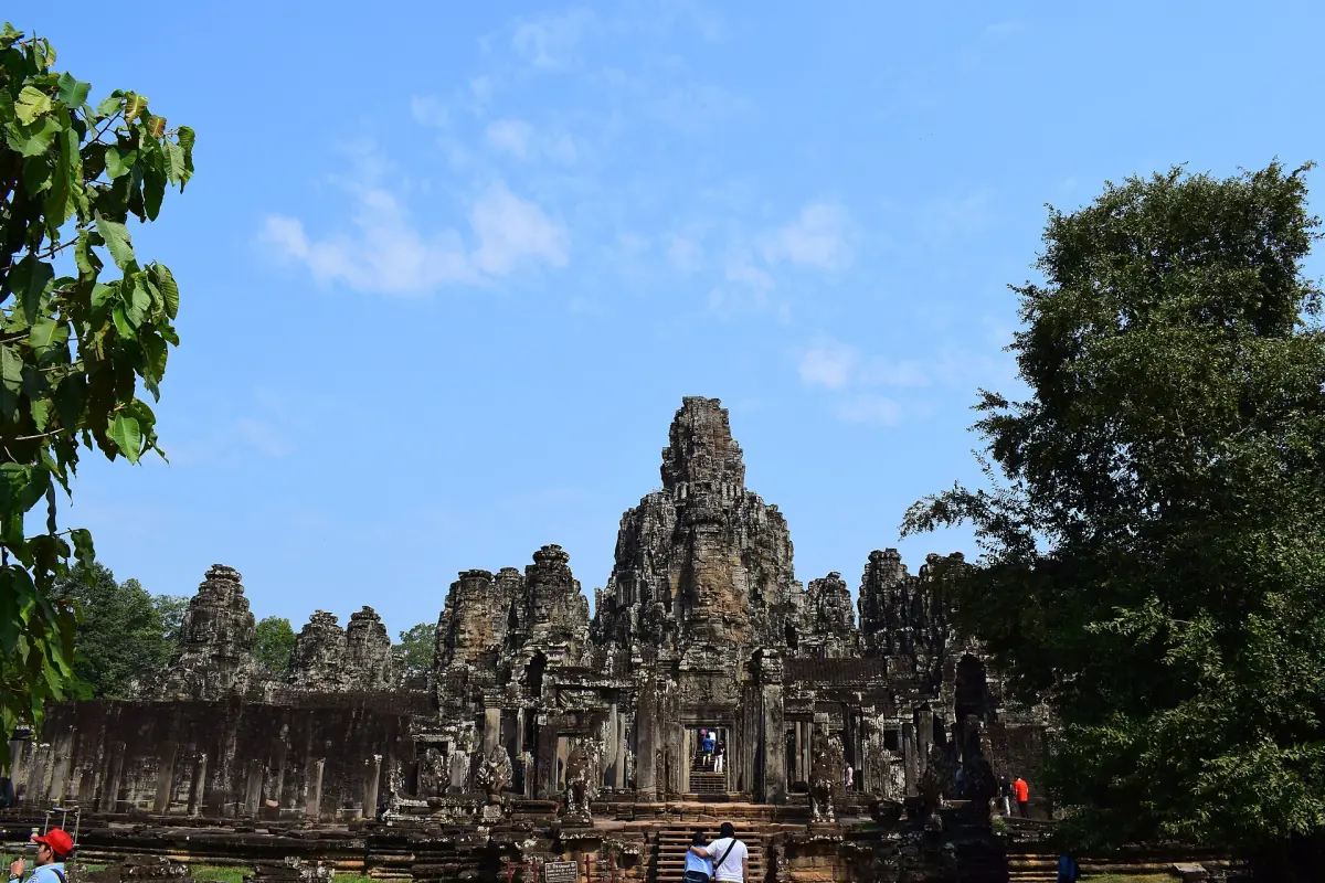 The Bayon towers seen from far across the trees
