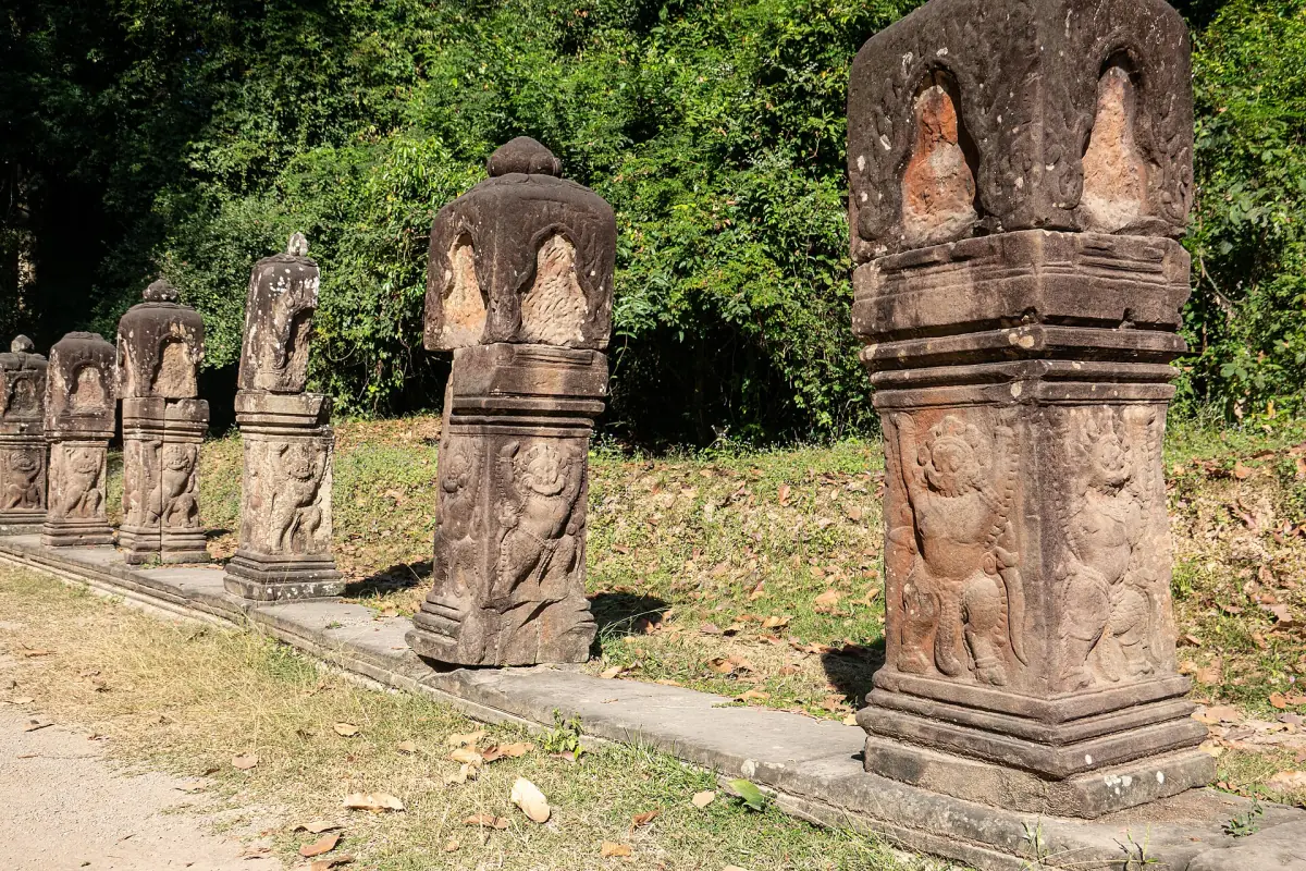Stone posts and guardian figures along the Preah Khan causeway
