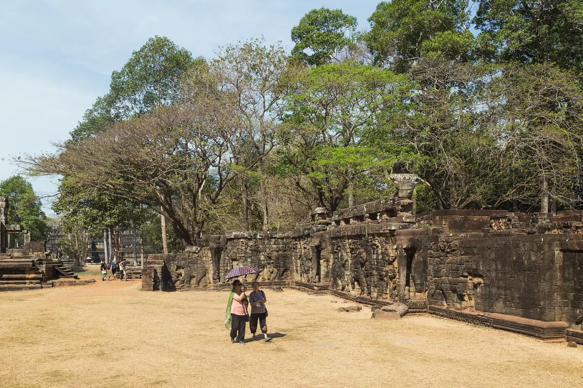 Wall of the Terrace of the Elephants seen along the grounds