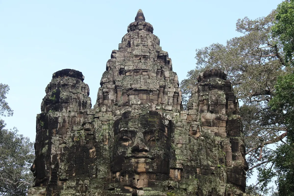 Towers of the Victory Gate carved with large stone faces